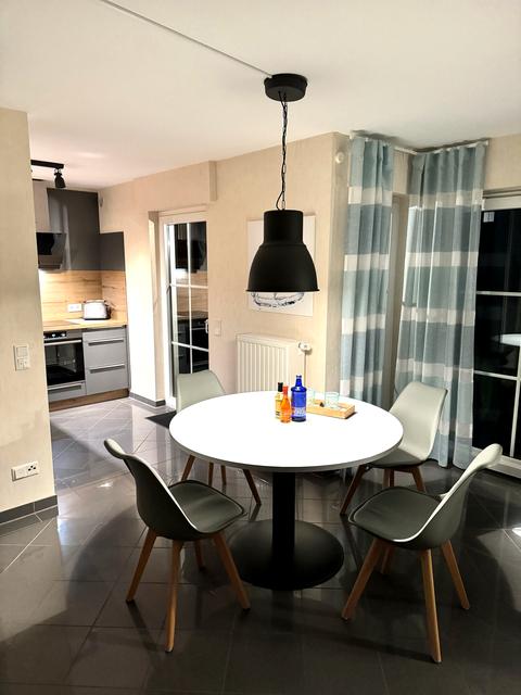 Dining area with a view of the kitchen units
