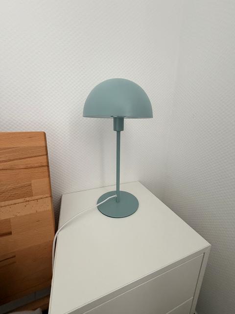 Bedside lamp in a maritime green tone