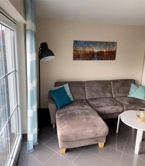 Sofa corner at the floor-to-ceiling terrace door