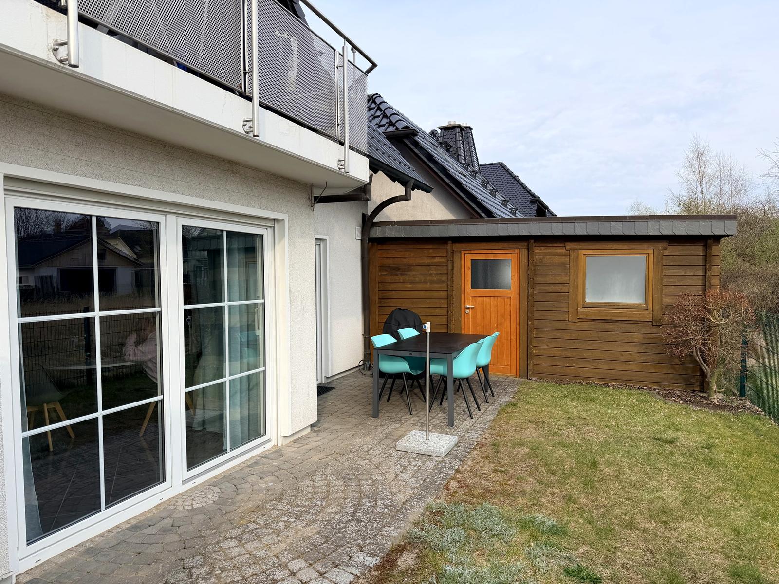 Terrace and garden in front of the holiday apartment